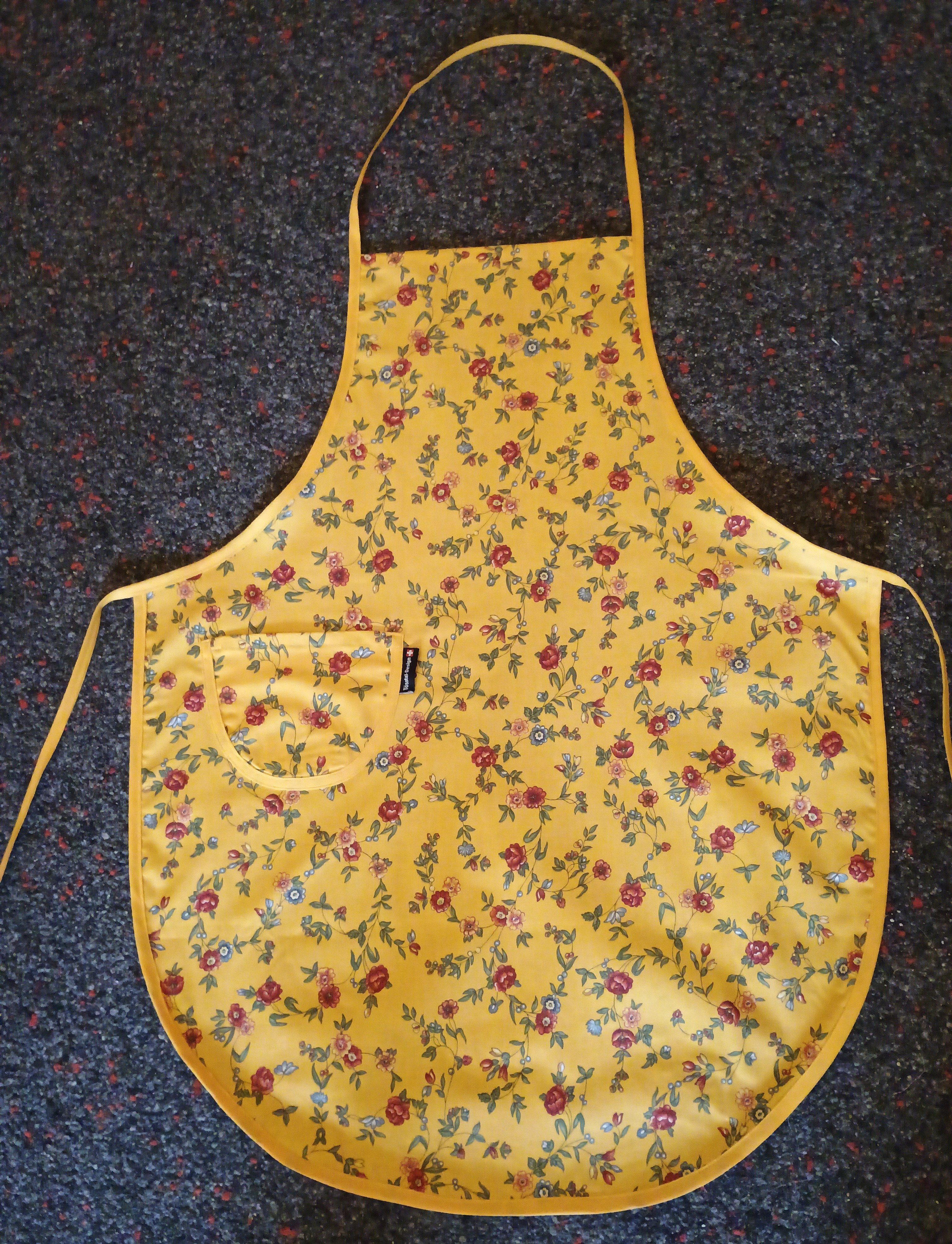 Schürze gelb mit Blumen Muster, CH Produktion